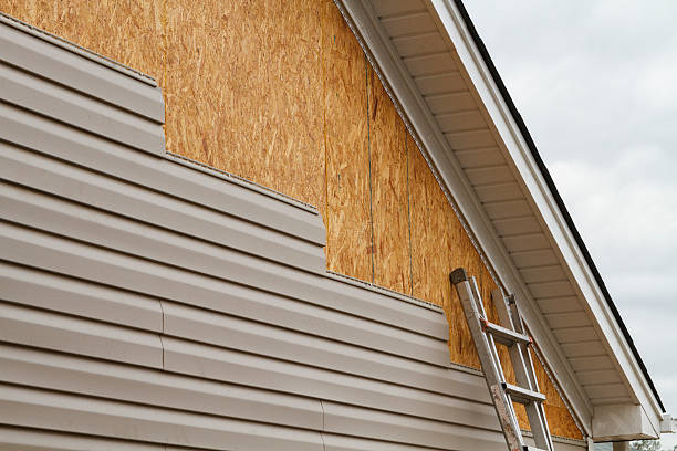 Professional Emergency Siding Repair technician working in Mead, CO